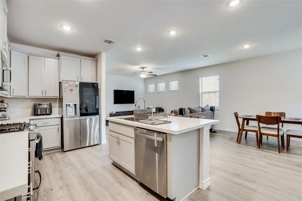 Dining room, Interior, Kitchen, Recessed Lighting, Stainless Steel Appliances, Wood Texture Flooring