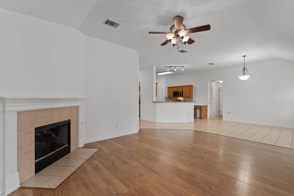 Empty room, Fireplace, Interior, Pendant Lights, Wood Texture Flooring