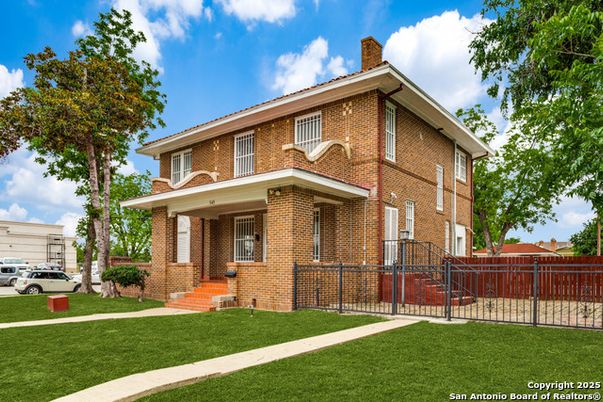 Exterior, Facade, Brick Facade, American Foursquare