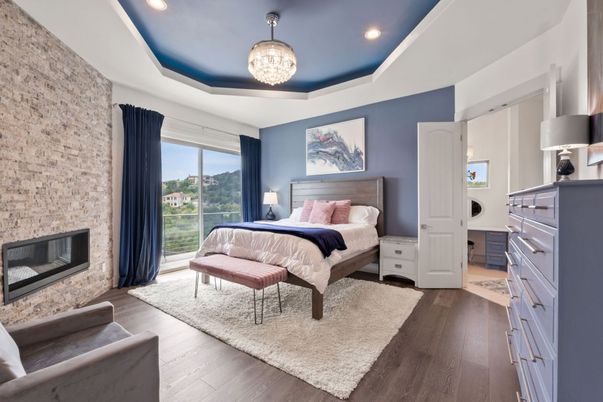 Bedroom, Chandelier, Fireplace, Interior, Recessed Lighting, Wood Texture Flooring