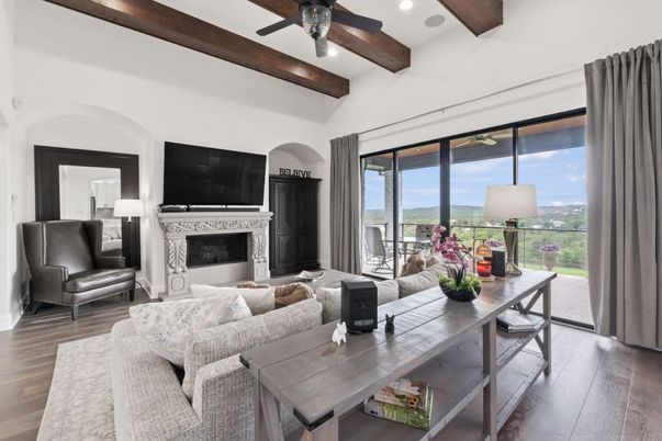 Dining room, Fireplace, Interior, Living room, Recessed Lighting, Water, Wooden Beams, Wood Texture Flooring
