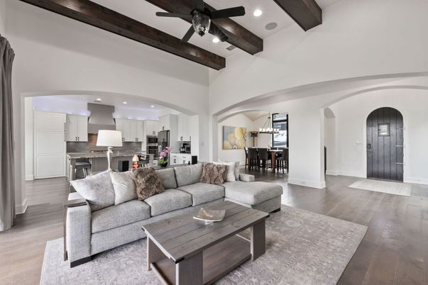 Chandelier, Dining room, Interior, Kitchen, Living room, Pendant Lights, Recessed Lighting, Stainless Steel Appliances, Wooden Beams, Wood Texture Flooring