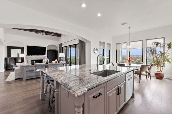 Chandelier, Dining room, Fireplace, Interior, Kitchen, Living room, Recessed Lighting, Water, Wood Texture Flooring