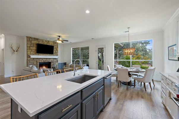 Dining room, Fireplace, Interior, Kitchen, Pendant Lights, Recessed Lighting, Stone Walls, Wood Texture Flooring