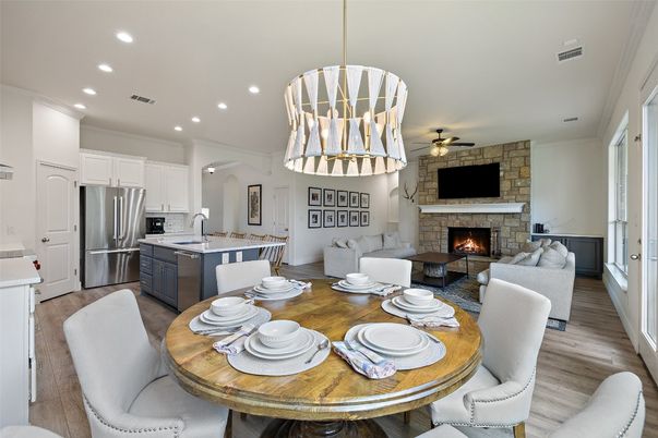 Dining room, Fireplace, Interior, Kitchen, Living room, Pendant Lights, Recessed Lighting, Stainless Steel Appliances, Stone Walls, Wood Texture Flooring