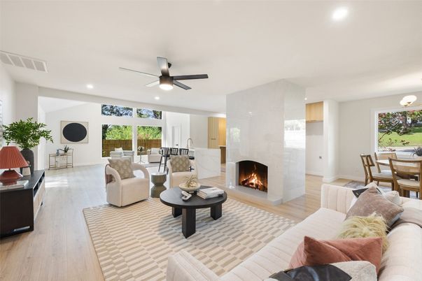 Dining room, Fireplace, Interior, Living room, Recessed Lighting, Wood Texture Flooring