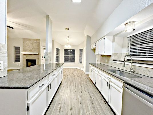 Chandelier, Fireplace, Interior, Kitchen, Pendant Lights, Stone Walls, Wood Texture Flooring