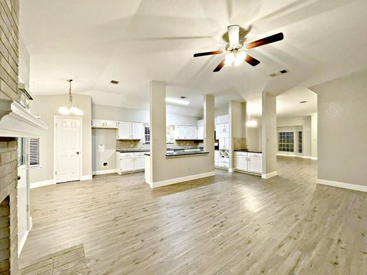 Empty room, Fireplace, Interior, Kitchen, Pendant Lights, Wood Texture Flooring