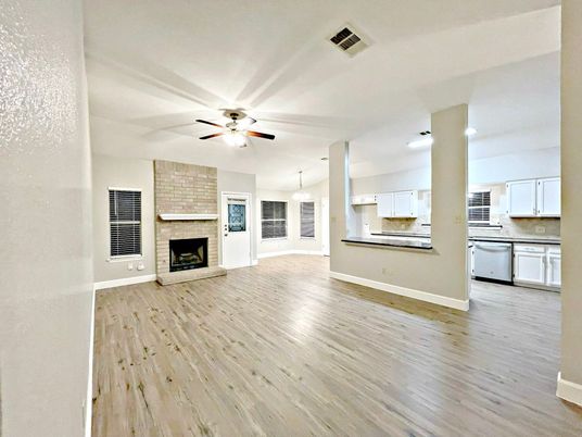 Empty room, Fireplace, Interior, Kitchen, Pendant Lights, Stone Walls, Wood Texture Flooring