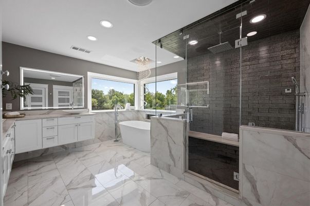 Bathroom, Chandelier, Dual Sink Vanities, Free Standing Baths, Glass Shower, Interior, Marble, Pendant Lights, Recessed Lighting