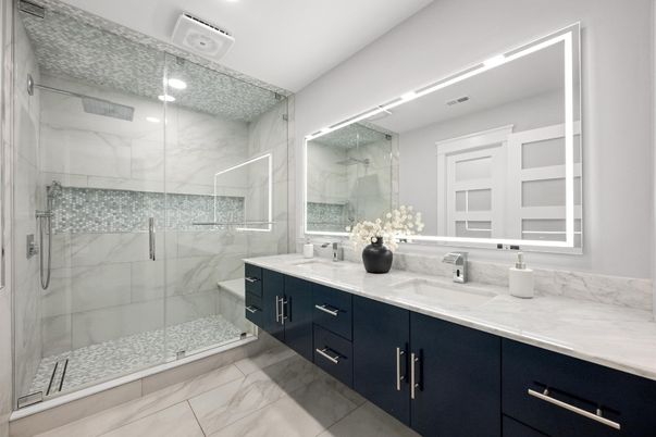 Bathroom, Dual Sink Vanities, Glass Shower, Interior, Marble, Marble Walls, Recessed Lighting