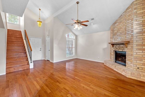 Empty room, Fireplace, Interior, Pendant Lights, Stone Walls, Wood Texture Flooring