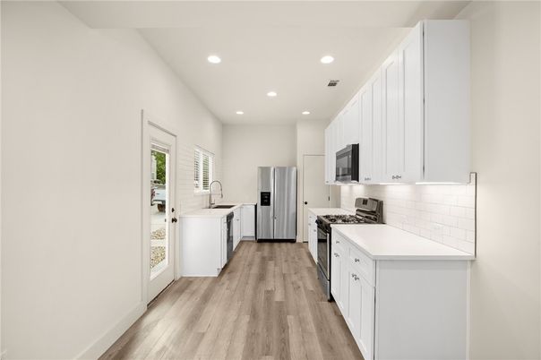 Interior, Kitchen, Recessed Lighting, Stainless Steel Appliances, Wood Texture Flooring