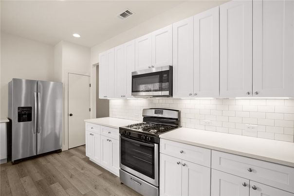 Interior, Kitchen, Recessed Lighting, Stainless Steel Appliances, Wood Texture Flooring