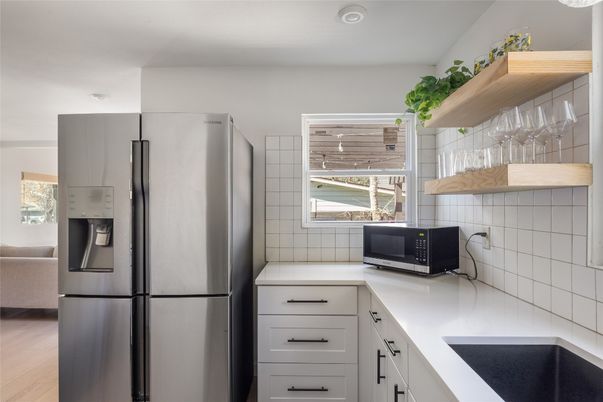 Interior, Kitchen, Recessed Lighting, Stainless Steel Appliances, Wood Texture Flooring