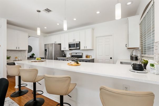 Interior, Kitchen, Pendant Lights, Recessed Lighting, Stainless Steel Appliances, Wood Texture Flooring