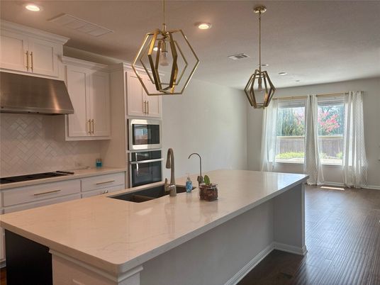 Interior, Kitchen, Pendant Lights, Recessed Lighting, Stainless Steel Appliances, Wood Texture Flooring