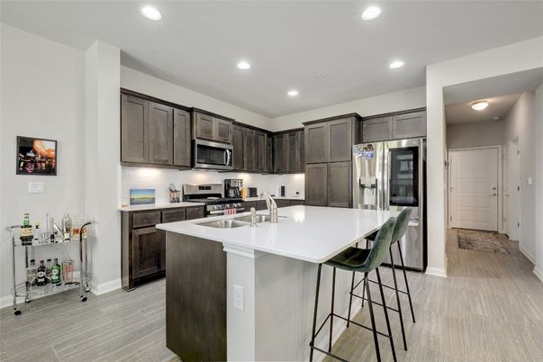 Interior, Kitchen, Recessed Lighting, Stainless Steel Appliances, Wood Texture Flooring