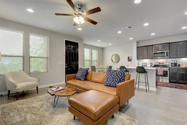 Dining room, Interior, Kitchen, Living room, Recessed Lighting, Stainless Steel Appliances, Wood Texture Flooring