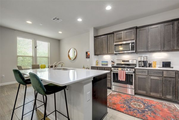 Interior, Kitchen, Recessed Lighting, Stainless Steel Appliances, Wood Texture Flooring