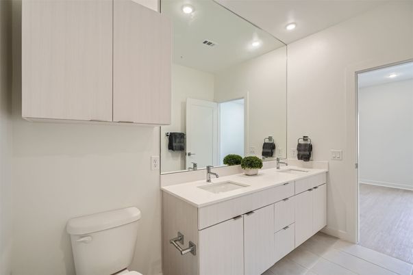 Bathroom, Dual Sink Vanities, Interior, Recessed Lighting, Wood Texture Flooring