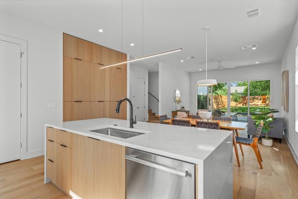 Dining room, Interior, Kitchen, Pendant Lights, Recessed Lighting, Stainless Steel Appliances, Wood Texture Flooring