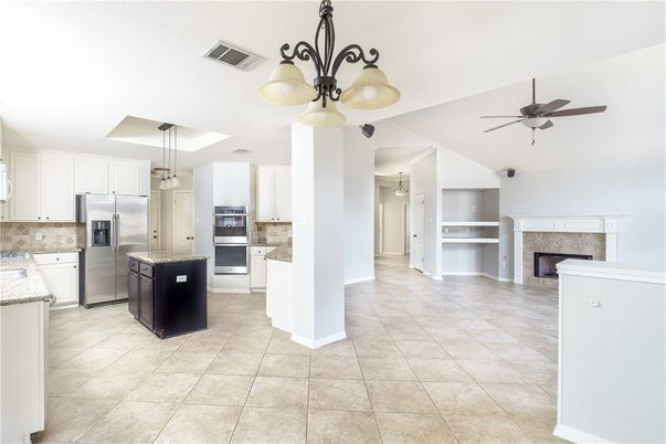 Fireplace, Interior, Kitchen, Pendant Lights, Stainless Steel Appliances