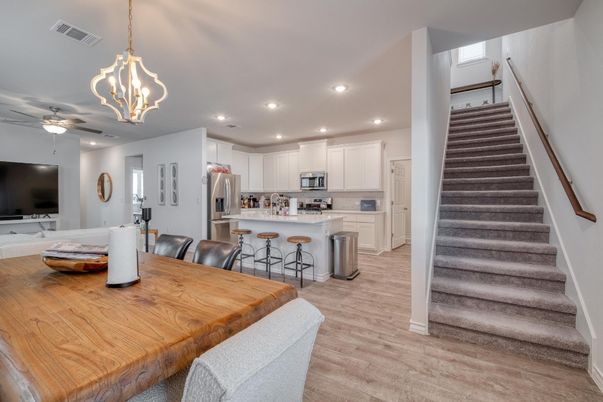 Dining room, Interior, Kitchen, Pendant Lights, Recessed Lighting, Stainless Steel Appliances, Wood Texture Flooring
