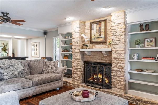 Fireplace, Interior, Living room, Recessed Lighting, Stone Walls, Wood Texture Flooring