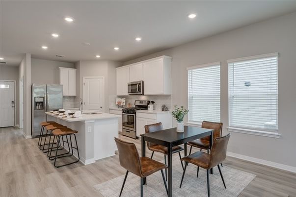 Dining room, Interior, Kitchen, Recessed Lighting, Stainless Steel Appliances, Wood Texture Flooring