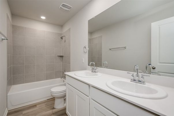 Bathroom, Dual Sink Vanities, Interior, Recessed Lighting, Wood Texture Flooring