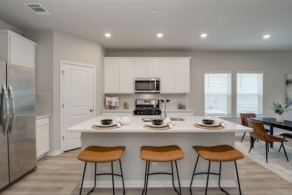 Dining room, Interior, Kitchen, Recessed Lighting, Stainless Steel Appliances, Wood Texture Flooring