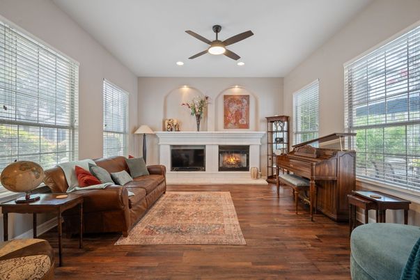Fireplace, Interior, Living room, Piano, Recessed Lighting, Wood Texture Flooring