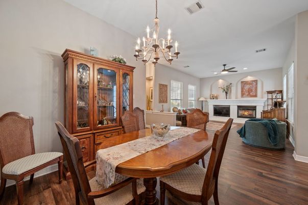 Chandelier, Dining room, Fireplace, Interior, Recessed Lighting, Wood Texture Flooring