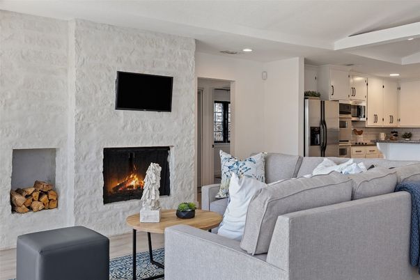Fireplace, Interior, Kitchen, Living room, Recessed Lighting, Stainless Steel Appliances, Wood Texture Flooring