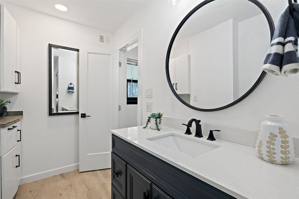 Bathroom, Dual Sink Vanities, Interior, Recessed Lighting, Wood Texture Flooring
