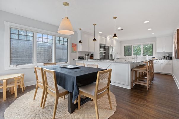 Dining room, Interior, Kitchen, Pendant Lights, Recessed Lighting, Stainless Steel Appliances, Wood Texture Flooring