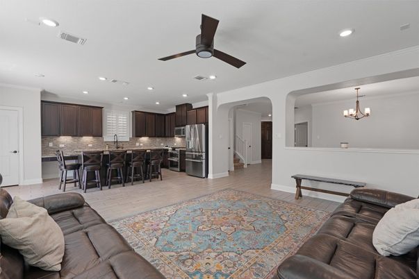 Chandelier, Dining room, Interior, Kitchen, Living room, Recessed Lighting, Stainless Steel Appliances, Wood Texture Flooring