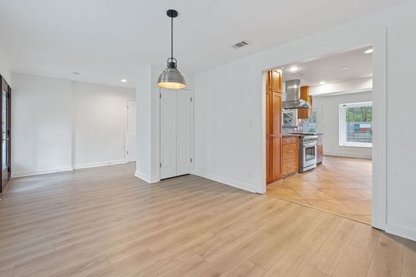 Interior, Kitchen, Pendant Lights, Recessed Lighting, Stainless Steel Appliances, Wood Texture Flooring