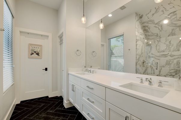 Bathroom, Dual Sink Vanities, Interior, Marble, Marble Walls, Pendant Lights, Recessed Lighting