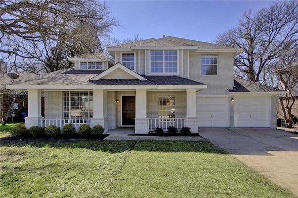 Attached, Exterior, Facade, Brick Facade, American Foursquare