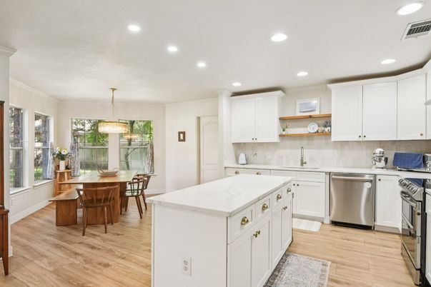Dining room, Interior, Kitchen, Pendant Lights, Recessed Lighting, Stainless Steel Appliances, Wood Texture Flooring