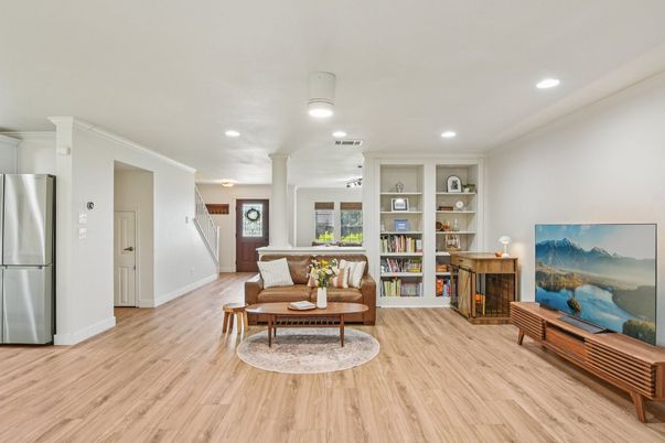Fireplace, Interior, Living room, Recessed Lighting, Stainless Steel Appliances, Wood Texture Flooring
