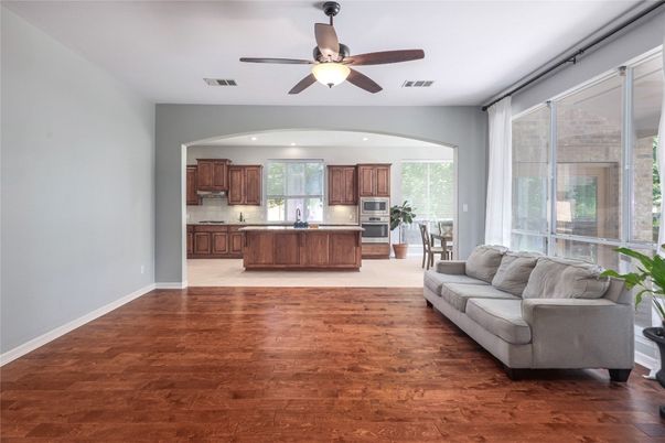 Dining room, Interior, Kitchen, Recessed Lighting, Stainless Steel Appliances, Wood Texture Flooring