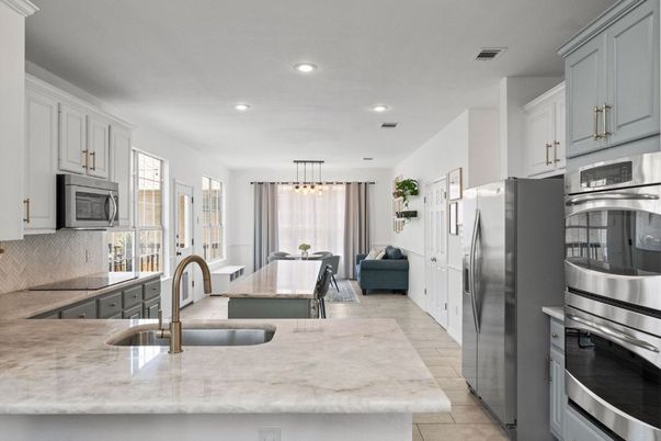 Dining room, Interior, Kitchen, Living room, Pendant Lights, Recessed Lighting, Stainless Steel Appliances, Wood Texture Flooring