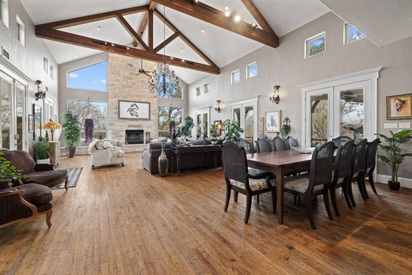 Dining room, Fireplace, Interior, Living room, Recessed Lighting, Stone Walls, Wooden Beams, Wood Texture Flooring