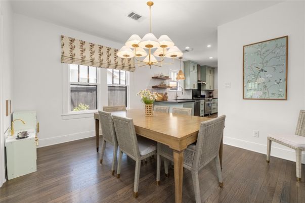 Chandelier, Dining room, Interior, Kitchen, Recessed Lighting, Stainless Steel Appliances, Wood Texture Flooring