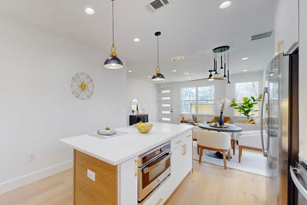 Dining room, Interior, Kitchen, Pendant Lights, Recessed Lighting, Stainless Steel Appliances, Wood Texture Flooring