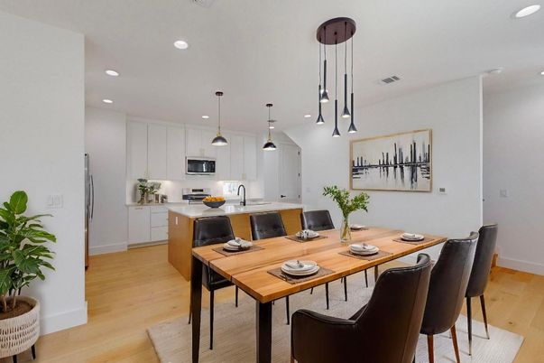 Dining room, Interior, Kitchen, Pendant Lights, Recessed Lighting, Stainless Steel Appliances, Wood Texture Flooring