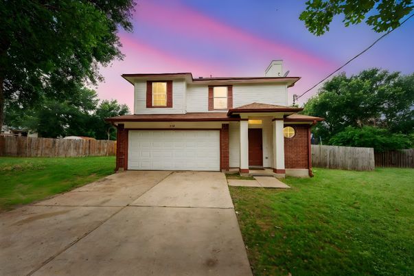 Attached, Backyard, Exterior, Facade, Brick Facade, Modern